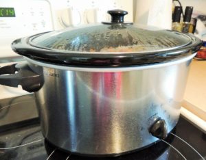 Slow cooker cooking food 