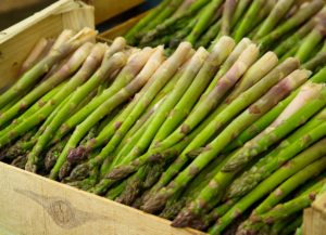 Asparagus in boxes at market