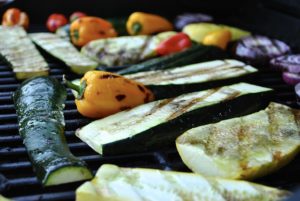 Grilling zuchinni, pepers and onions