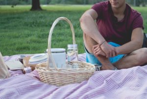 picnic with water and snacks separated