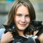 Girl with Kittens