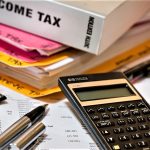 income tax materials, calculator files, and pencils