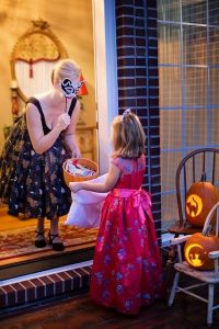 costumed child trick or treating
