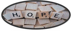 blocks of wood with the word HOPE spelled out