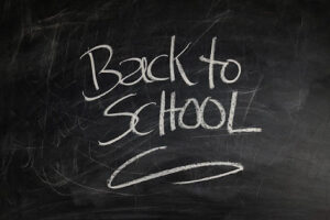 back to school written on chalkboard