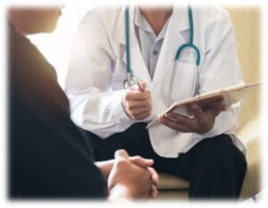 Physician visiting with patient