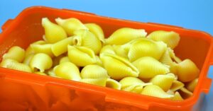 container of cooked pasta
