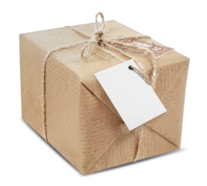 package wrapped in brown paper and gift tag
