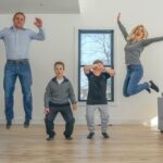 Family jumping for joy.