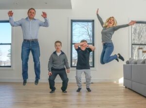 Family jumping for joy.