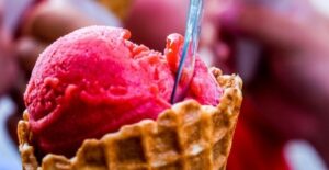 Raspberry sorbet in a cone