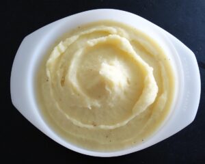 Bowl of fluffy mashed potatoes